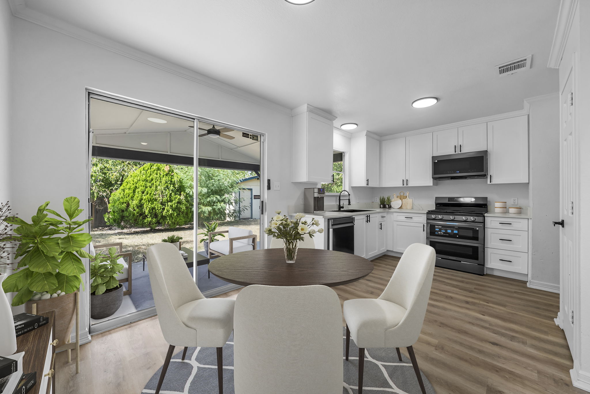 Virtually staged. Open floor plan, updated kitchen and appliances.