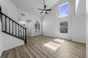 Living room with soaring ceilings and natural light