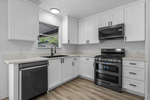 Kitchen at the back of the house overlooking the back yard.