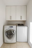 Laundry.  Washer/Dryer conveys not warranted