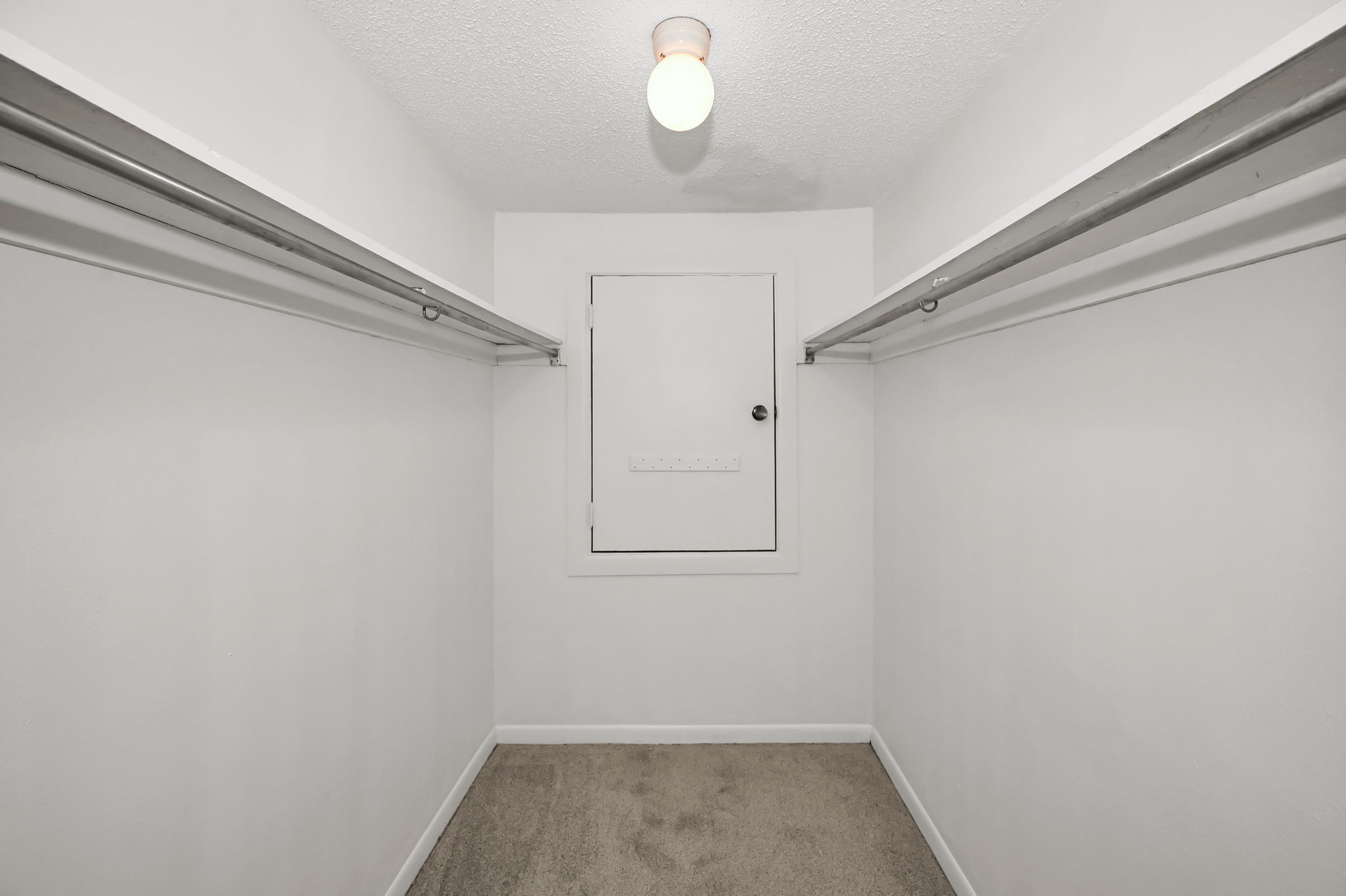 Upper Level Primary Bedroom Walk-in Closet1a