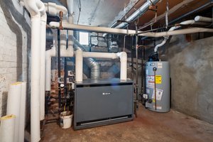 Commercial-grade steam heat - Unico A/C system with ducts to all three floors.