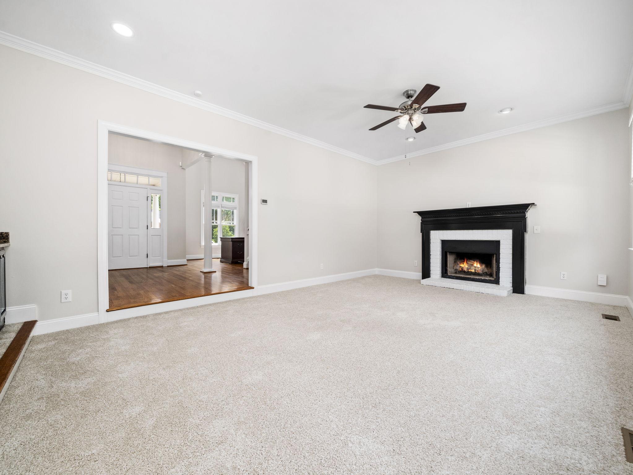 Step down Living room with fireplace and wetbar