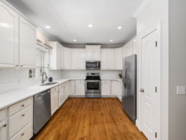 42" cabinets, Quartz counters & tiled backsplash