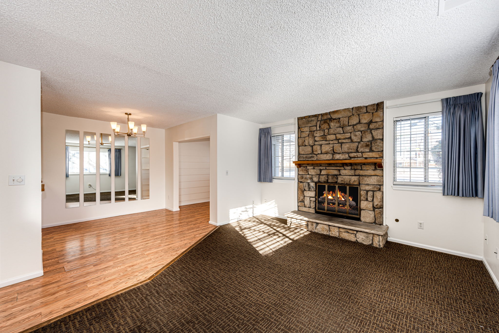 Living room with a cozy fireplace to keep you warm on a chilly Colorado night