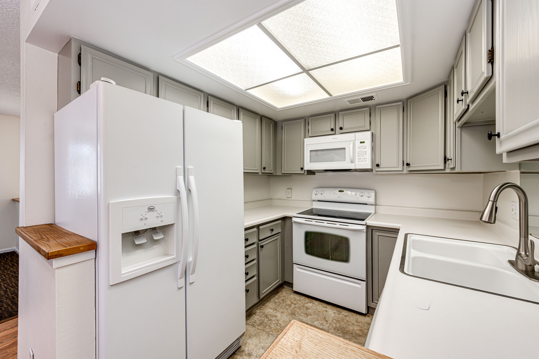 Spacious kitchen with plenty of cabinets and counter space