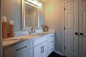 Full bathroom with linen closet off office/bedroom.