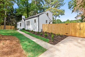 Front of Structure - Welcome to this beautifully renovated bungalow featuring a charming facade that sets the tone for the upscale living experience within.