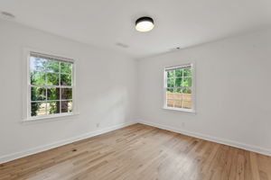 Secondary Bedroom #2 - To the right of the hallway extending from the living room, Bedroom 2 provides similar spaciousness, perfect for various uses.