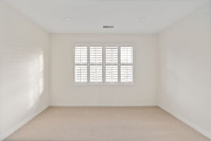 Rear Guest Bedroom w/window shutters