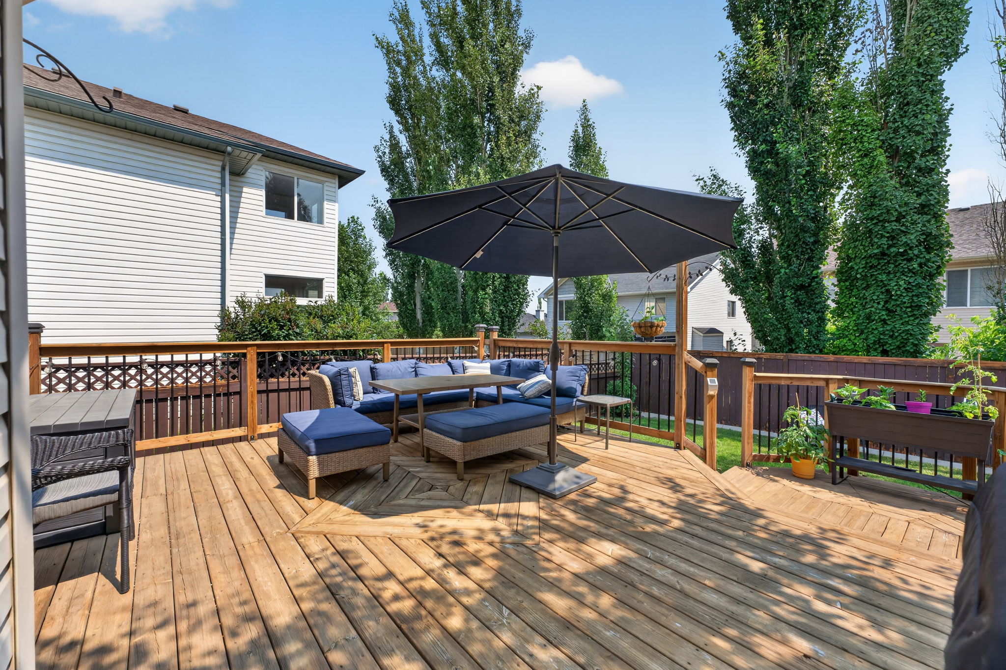 An entertainer’s deck with covered lounge