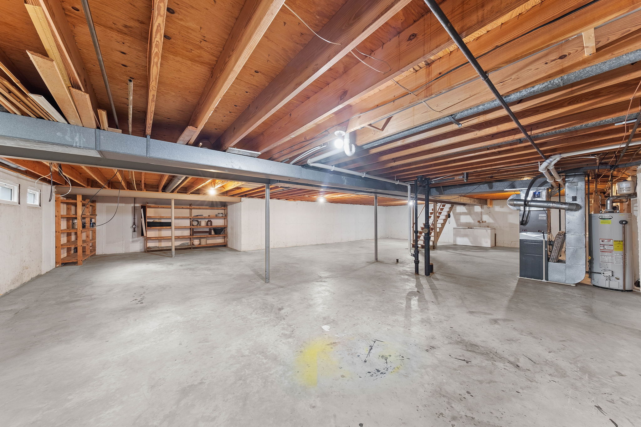 Theater, playroom, game room, home office, yoga studio, bar? Room to do anything and everything.  Double your living space by renovating this incredible basement.