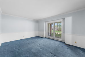 Note- beneath the blue carpets are the ORIGINAL hardwood floors that have never been exposed.