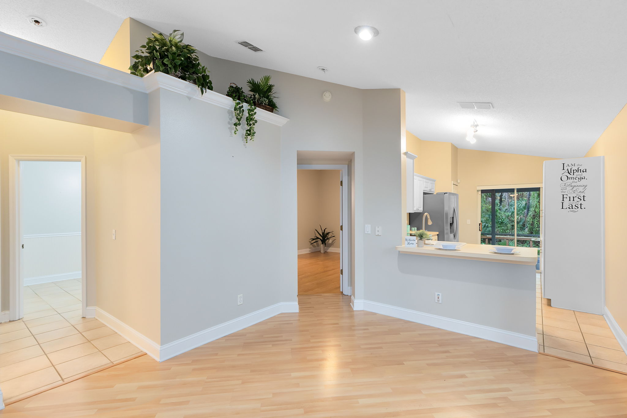 Dining Room with View to Hallway, Master Bedroom and Kitchen