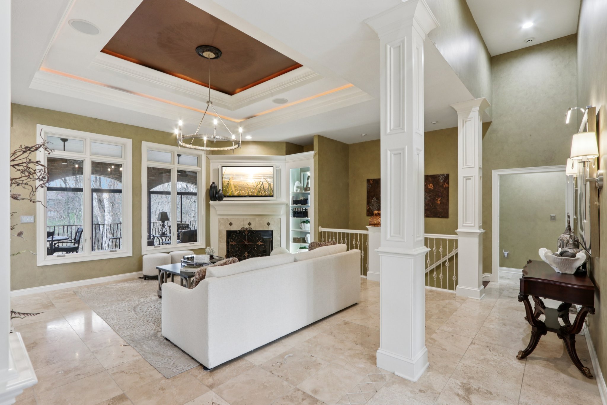 Enjoy warmth of the gas fireplace and open main level floorplan with views of the outdoors from the Great Room