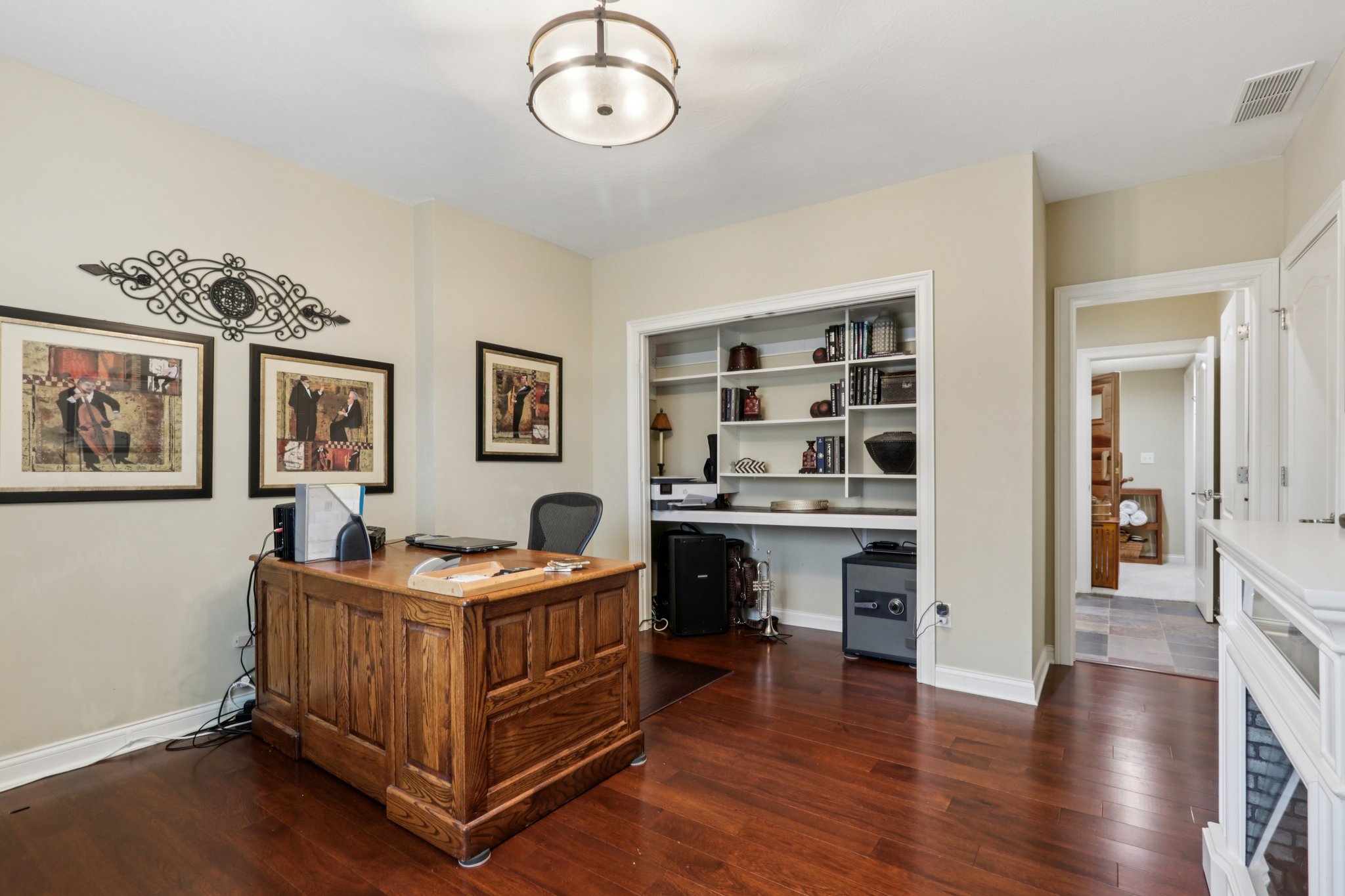 Bedroom 4, currently being used as an office offers direct access to the lower level Lanai and has an ensuite bathroom