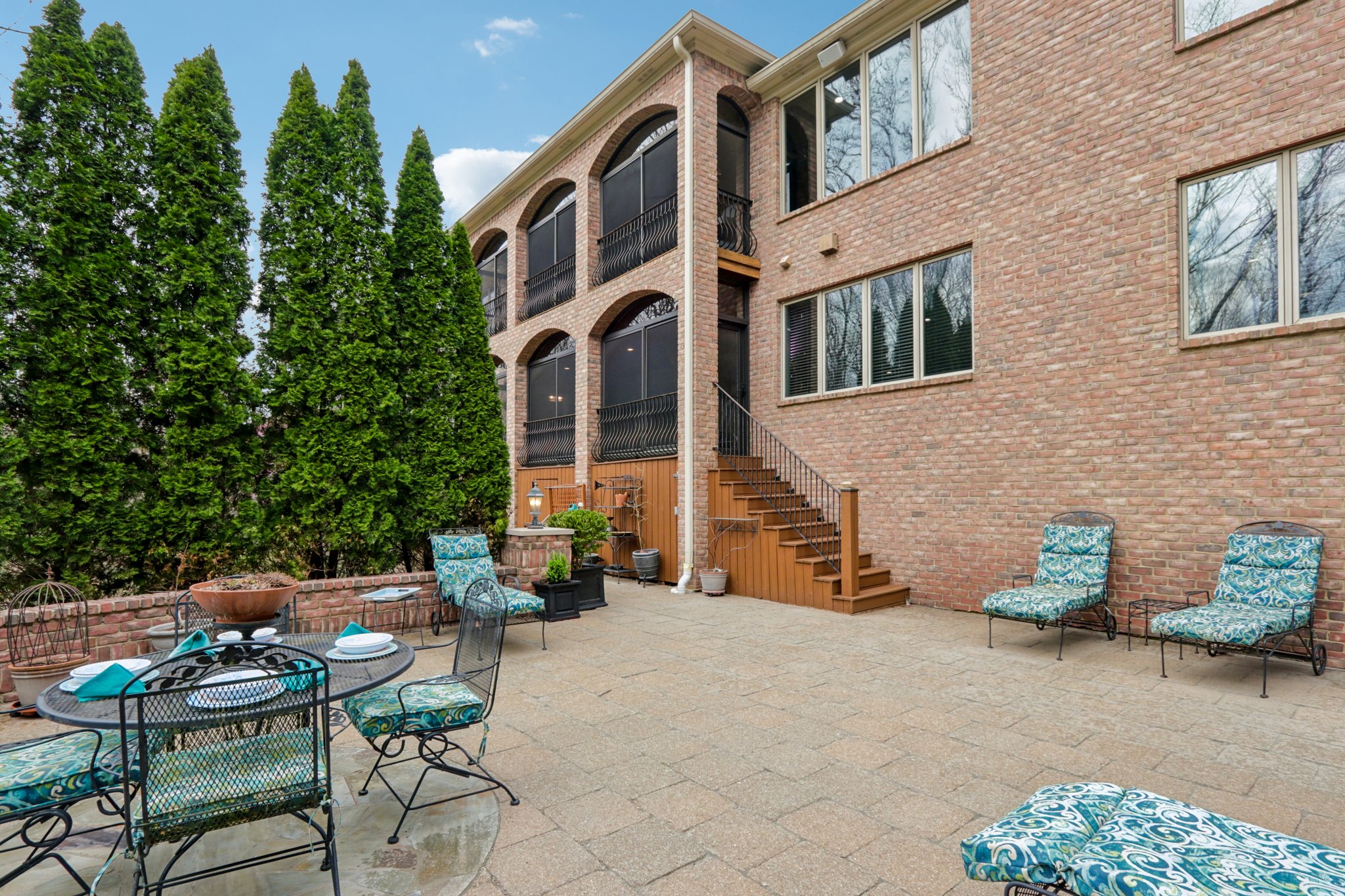 View of the 2 Lanai's and back of the home from the large paver patio area