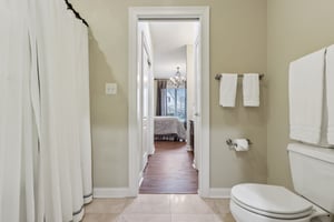 Jack-n-Jill Bathroom offers private vanities for both bedroom 2 and bedroom 3 on the main level