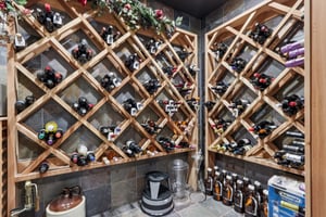 Wine Cellar located behind the bar in the lower level