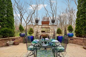 Enjoy dining al fresco with the outdoor gas fireplace and beautiful sunsets