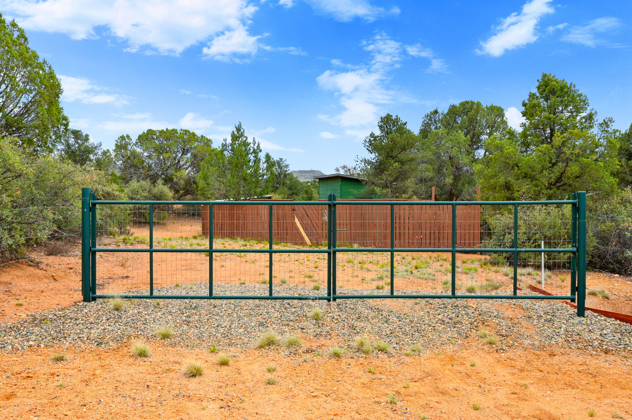 Double Gate to 16' Road on Backside of Property