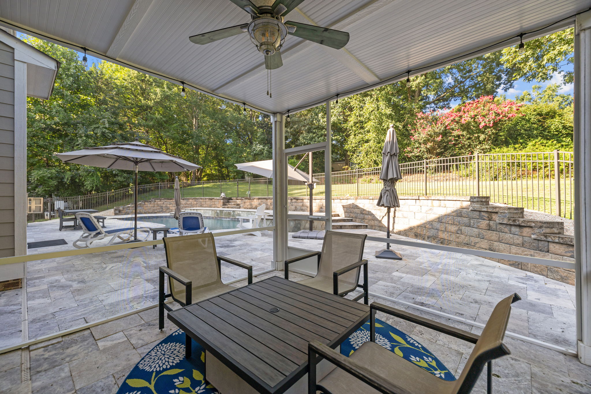 Screened in Patio overlooking pool and backyard
