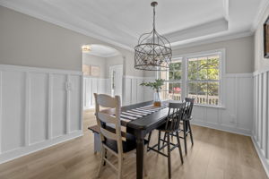 Custom wainscoting in formal dining room