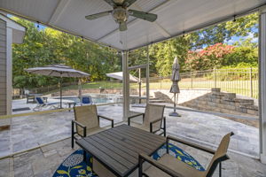 Screened in Patio overlooking pool and backyard