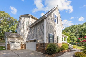 Three care garage and ample parking space