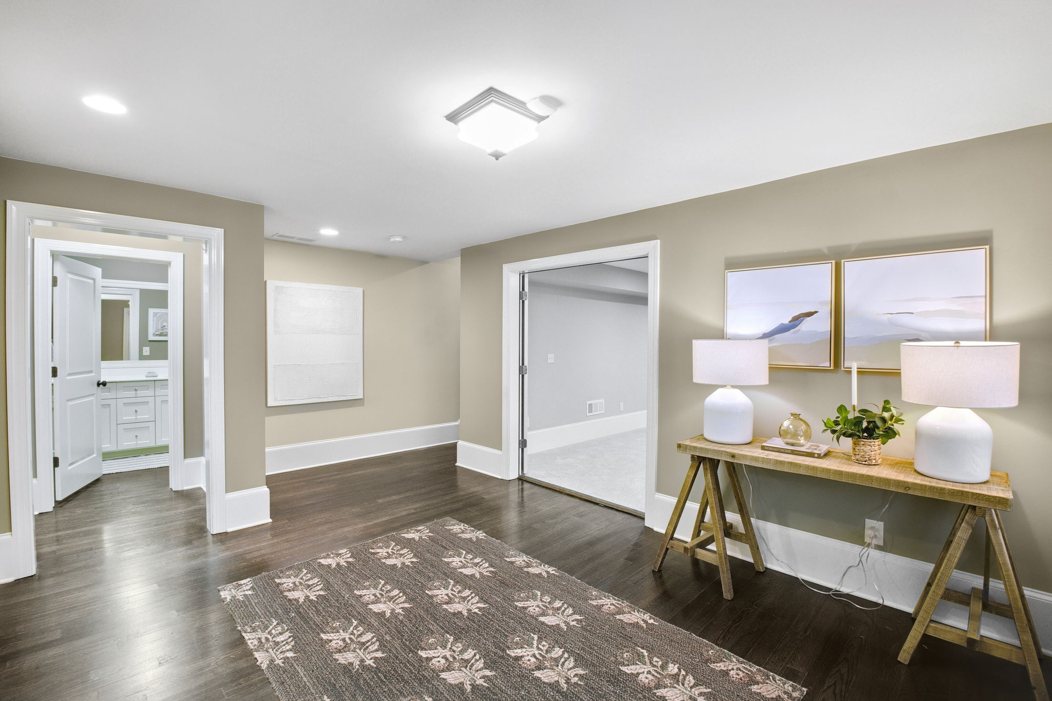 This spacious foyer in the terrace level which leads to the bedroom/office, media room and bathroom.