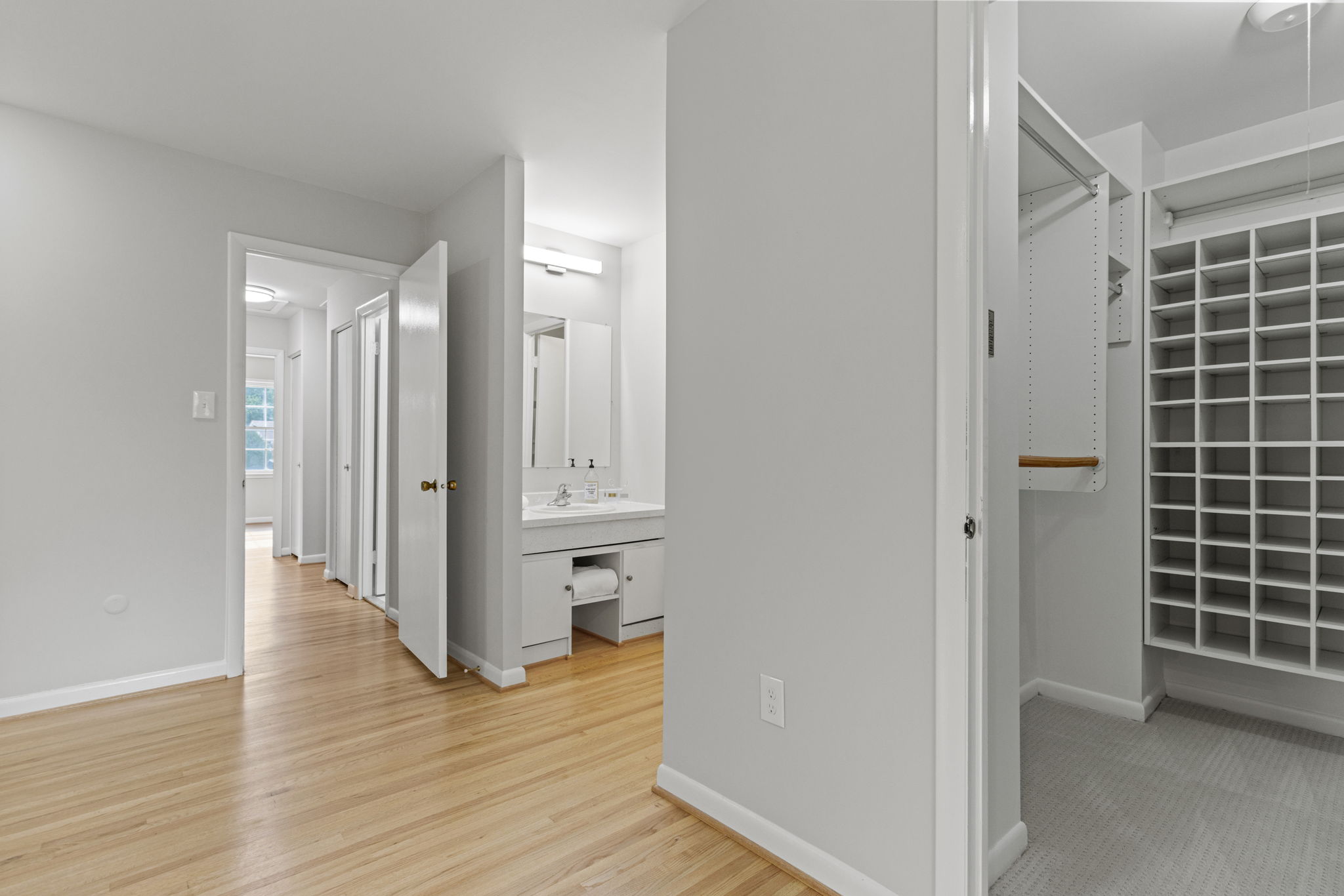 Primary Bedroom with large walk in closet and dressing area