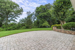 Expansive rear patio with private yard views