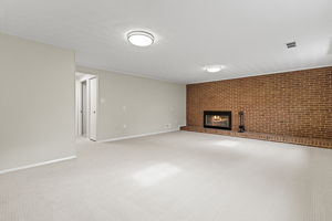 Expansive Family Room with wood burning fireplace