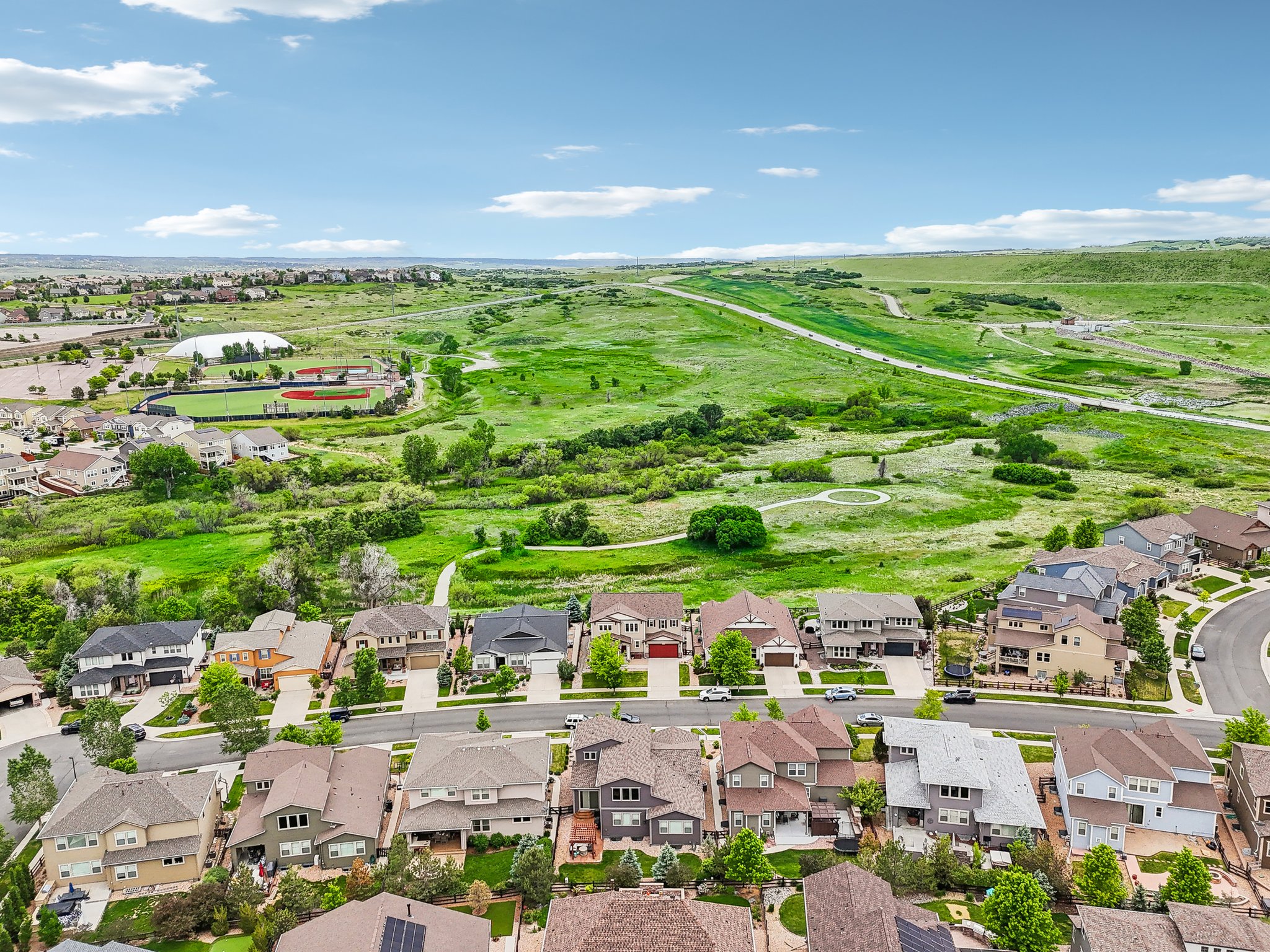 Aerial - Open Space And Trails Behind Home