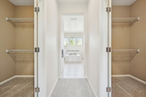 Primary Bedroom Closet - entry to bath