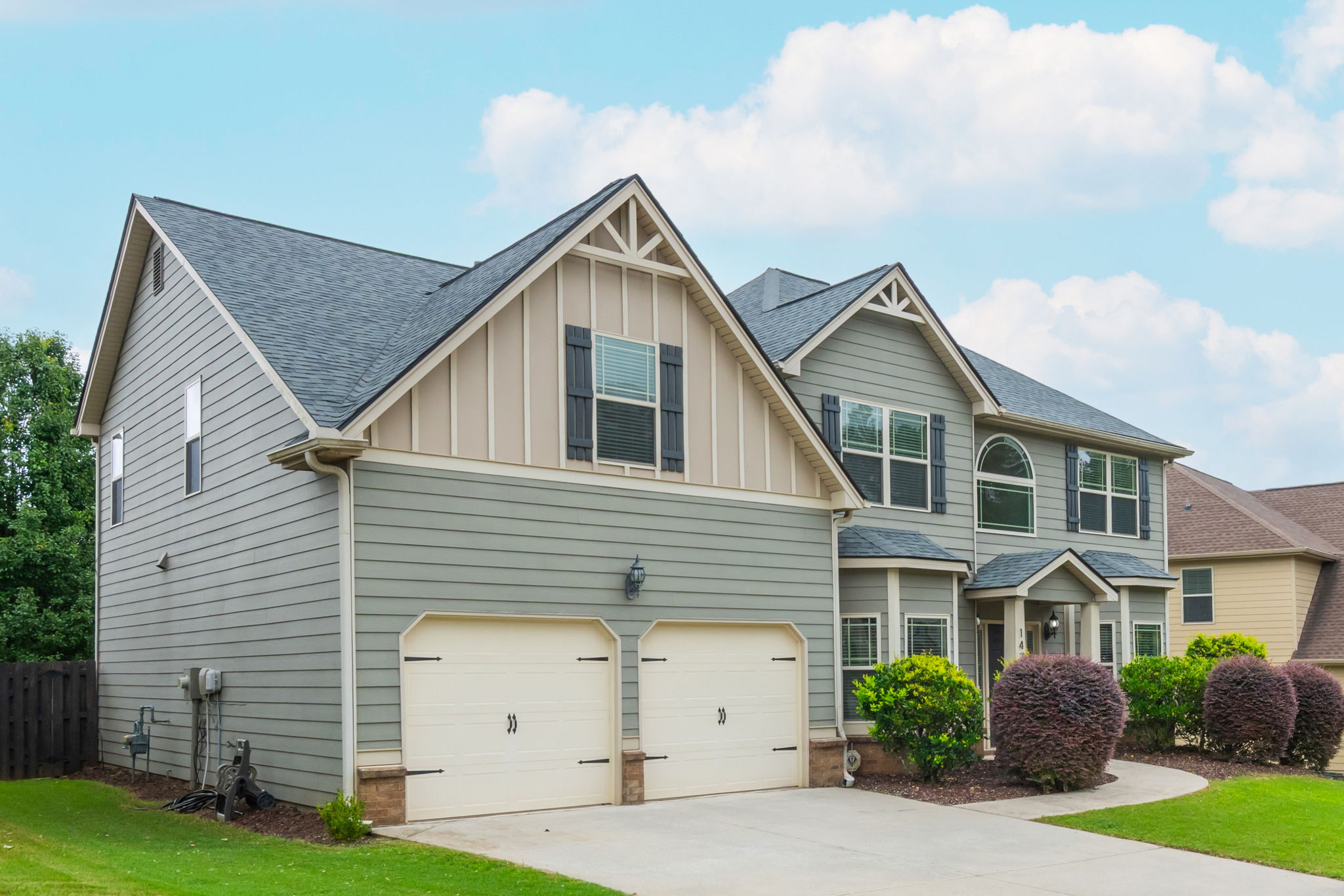 Level Driveway & Garage has custom Wood shelves for storage.