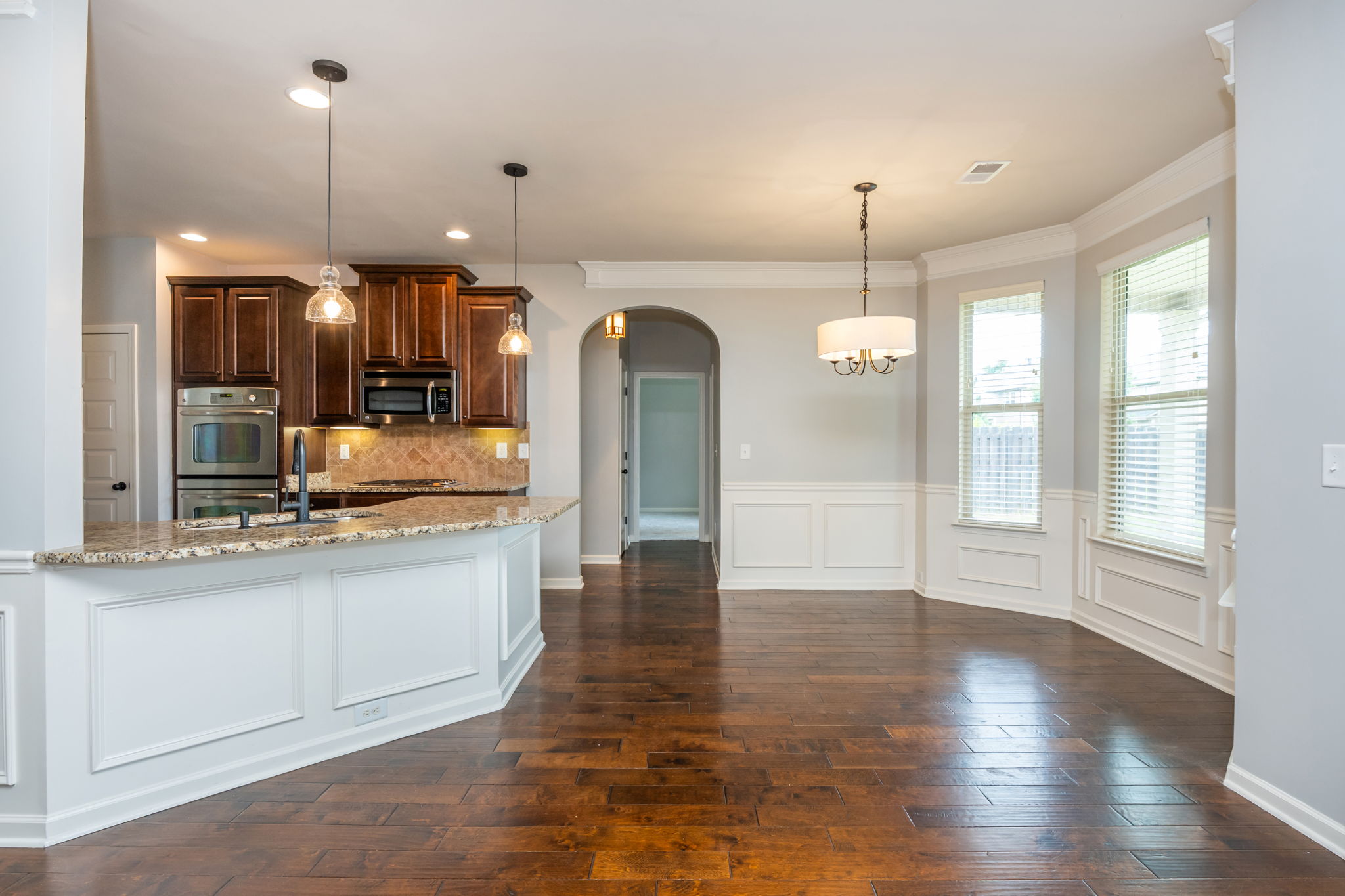 Br & Full Bath on Main (straight down the hallway).