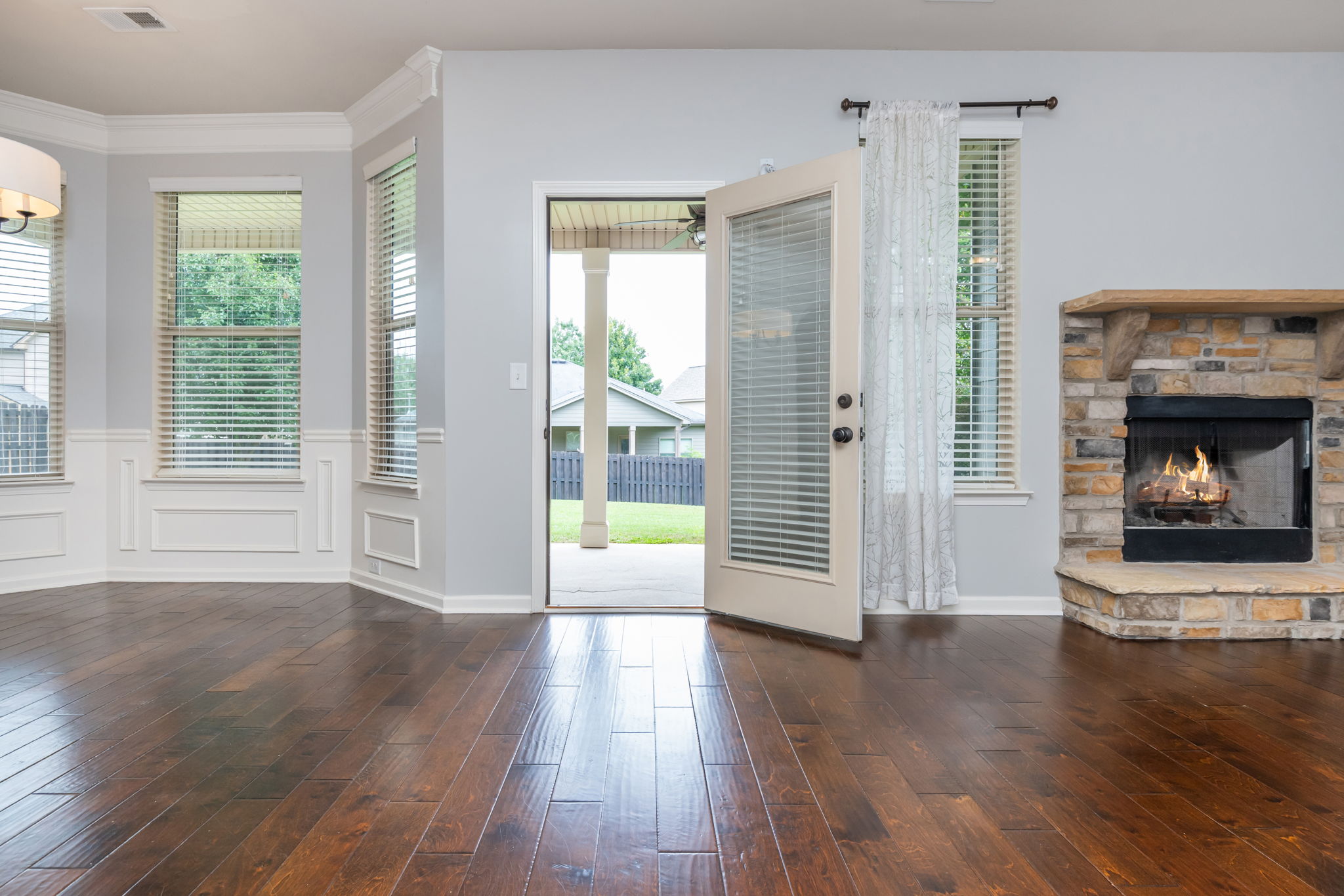 Easy access to your Fenced in Yard w Covered Patio.