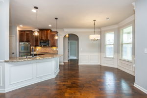 Br & Full Bath on Main (straight down the hallway).