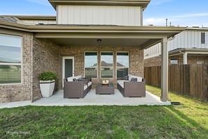 Back Covered Patio virtually staged.jpeg