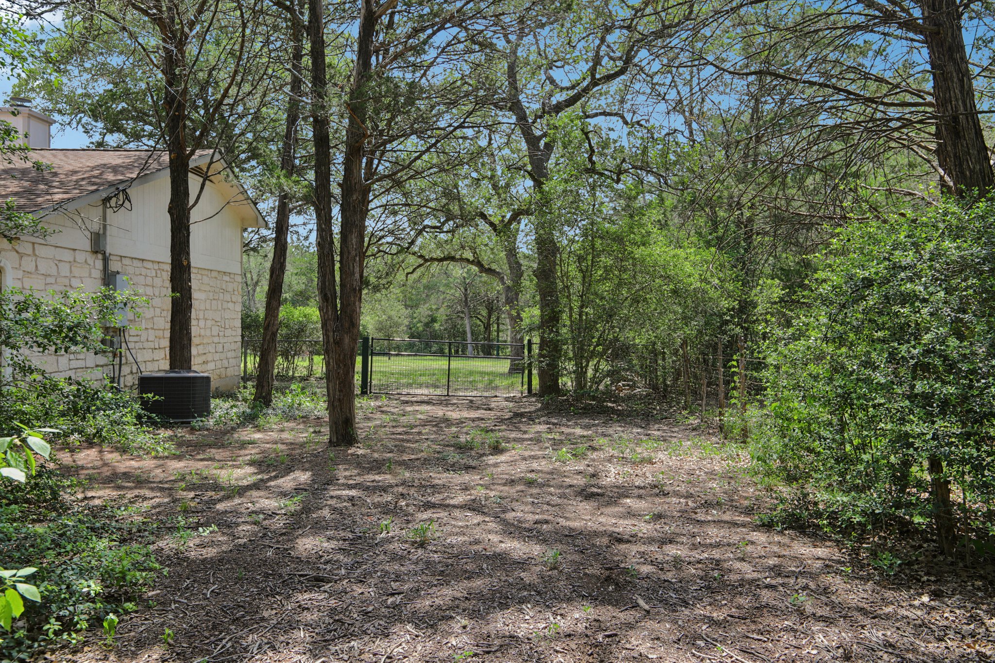 2nd drive gated access to backyard