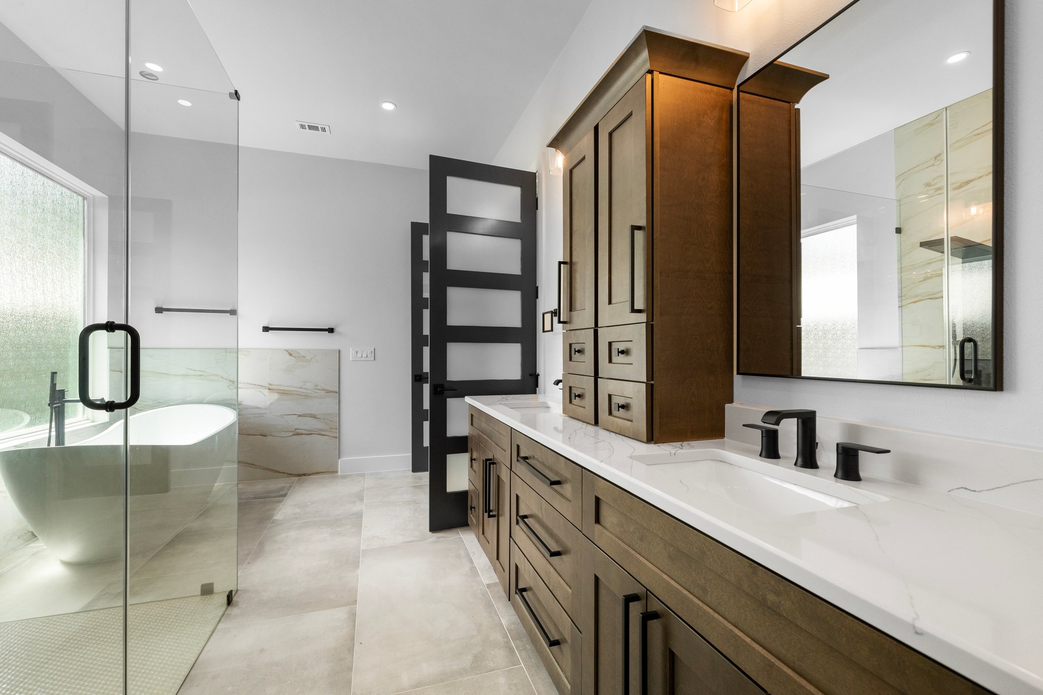 Elegant primary bathroom with plenty of storage!