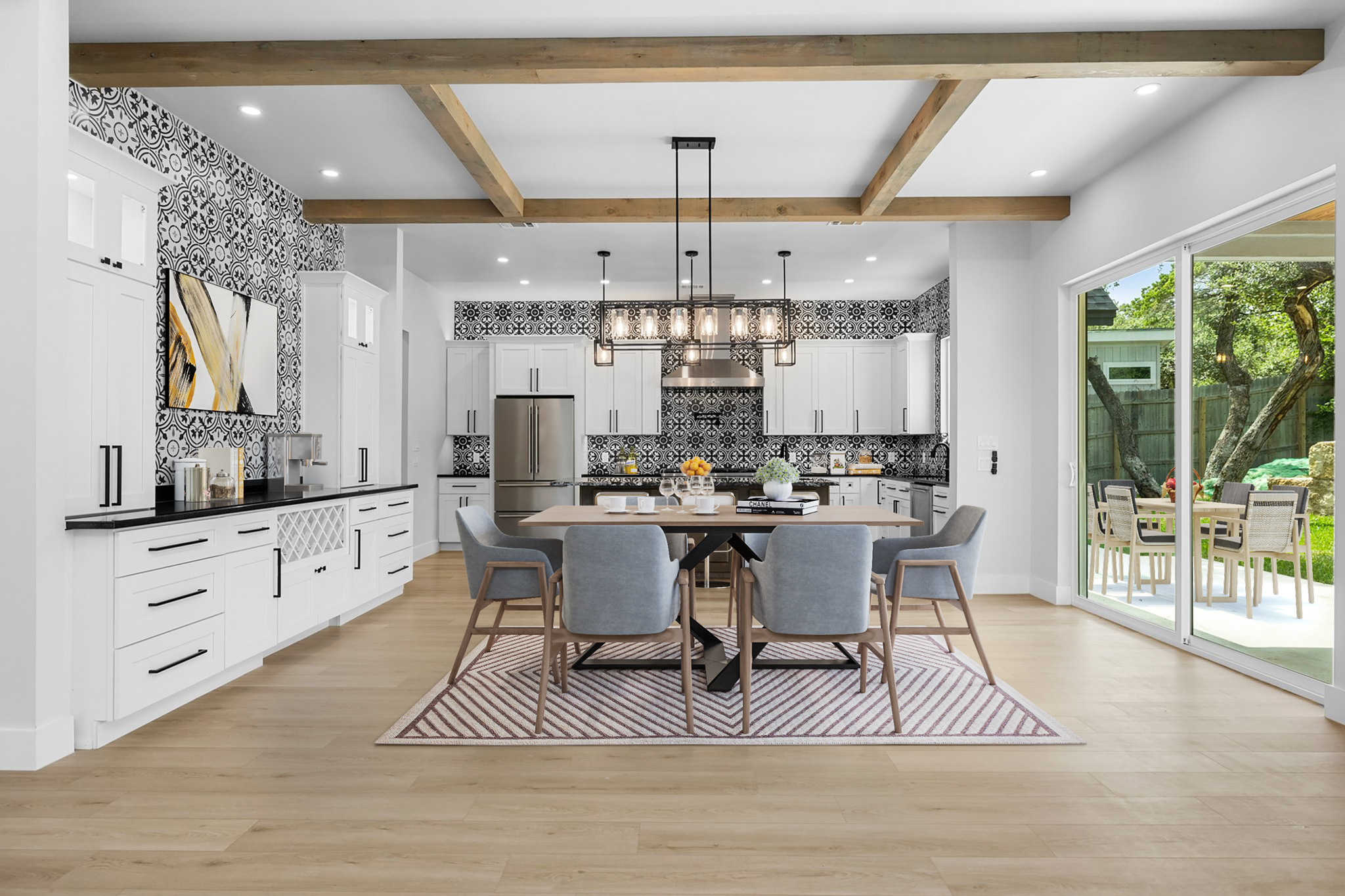 Large dining and kitchen with abundance of cabinets. Virtually staged.