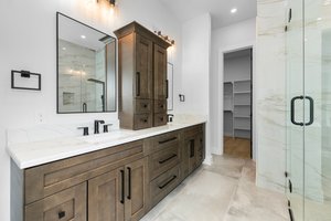 Elegant primary bathroom with plenty of storage!