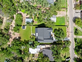 Overhead view. Back yard to the left, front yard to the right. The upper back yard is large enough for a pool.