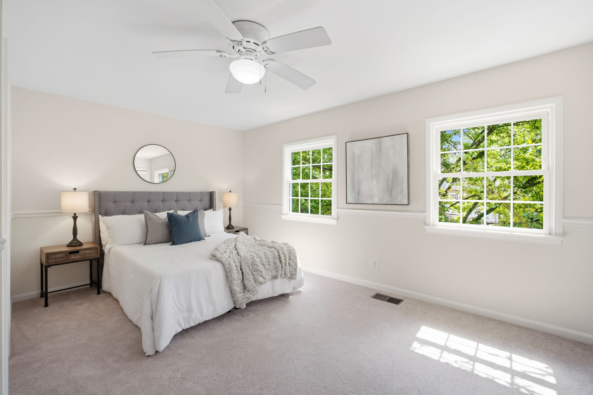 Large, light-filled primary bedroom