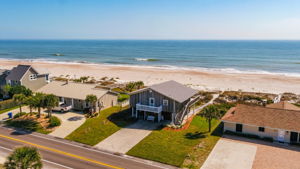 Aerial of spectacular oceanfront location. Good view too of the new roof with architectural shingles!