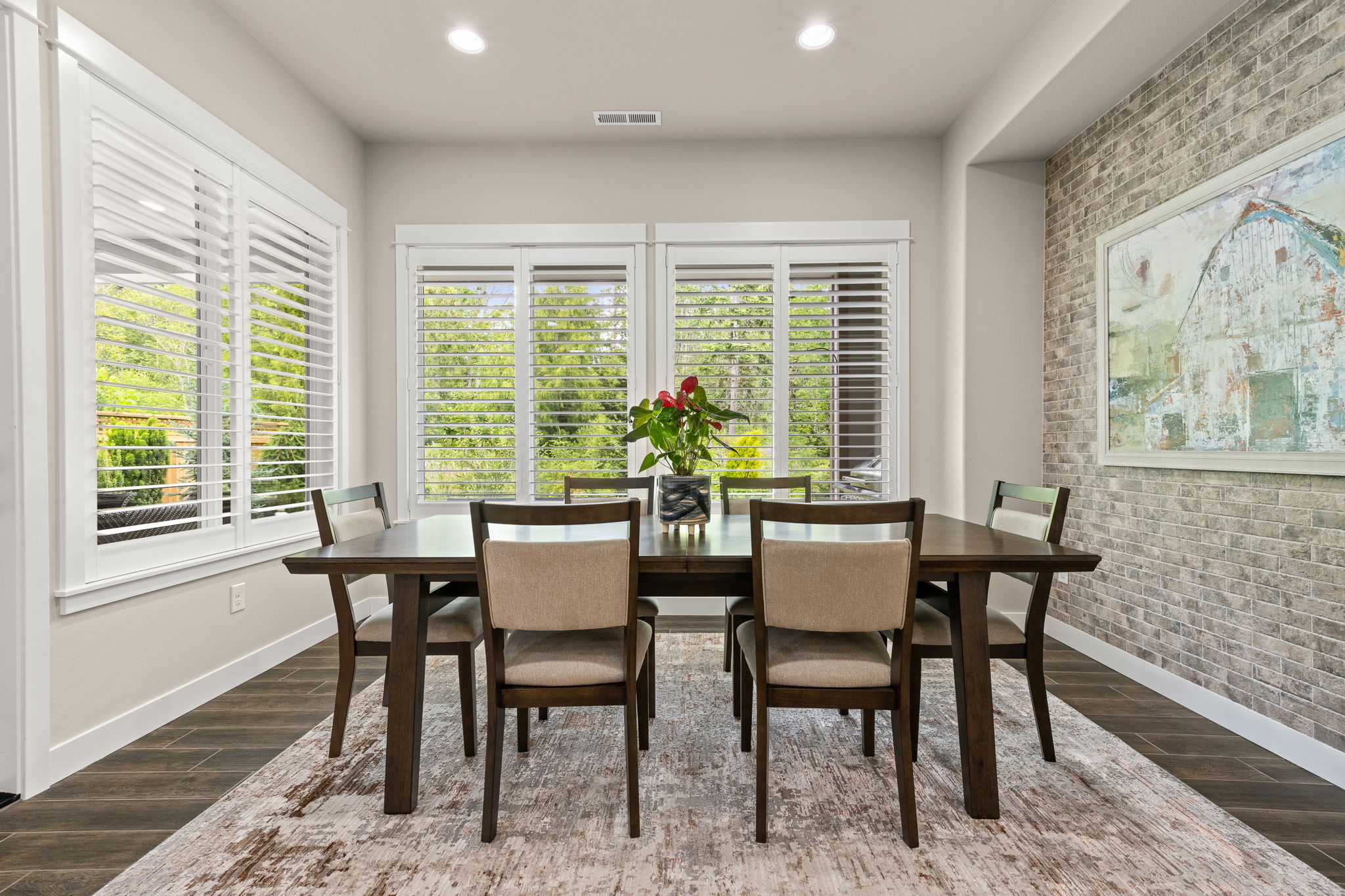 Gather for meals and view plush greenbelt