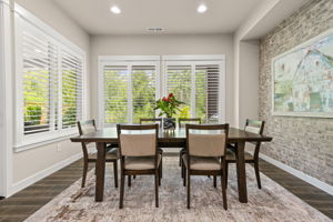 Gather for meals and view plush greenbelt