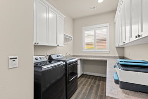Tidy and tasteful laundry room